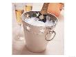 Bottle Of Champagne In Silver Bucket Of Ice by Vito Aluia Limited Edition Print