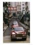 One Of Hong Kongs Many Rolls Royce Cars In Central by Eightfish Limited Edition Print