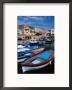Fishing Boats Moored At La Maddalena Marina, Sassari, Maddalena, Sardinia, Italy by Dallas Stribley Limited Edition Pricing Art Print