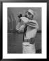 Coast Guard Patrolling Mississippi River Opposite East Saint Louis Power Plant by Alfred Eisenstaedt Limited Edition Print