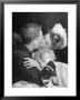 Officer Deeply Kissing A Model At A Nightclub by Allan Grant Limited Edition Print