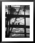 Workmen Against Smokey Sky As They Stand On Girders Of The New Carnegie Illinois Steel Plant by Margaret Bourke-White Limited Edition Print