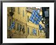 Flags Of The Onda (Wave) Contrada In The Via Giovanni Dupre, Siena, Tuscany, Italy, Europe by Ruth Tomlinson Limited Edition Print