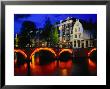 Illuminated Canal And Houses, Amsterdam, North Holland, Netherlands by Jon Davison Limited Edition Print