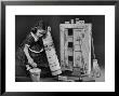 Little Girl With A Toy House Cleaning Kit by Walter Sanders Limited Edition Print