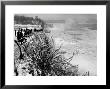 View Of Visitors Watching Ice Formations At The American Side Of A Frozen Niagara Falls by Margaret Bourke-White Limited Edition Pricing Art Print