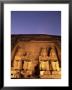 Floodlit Temple Facade And Colossi Of Ramses Ii (Ramesses The Great), Abu Simbel, Nubia, Egypt by Upperhall Ltd Limited Edition Print