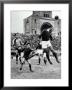 Soccer Players During A Game, Fighting For The Ball by A. Villani Limited Edition Print