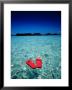 Red Thongs Floating On Sea Off Ko Kham, Thailand by Woods Wheatcroft Limited Edition Pricing Art Print