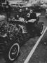 Hot Rodder Norm Grabowsky, At The Wheel Of His Ford Roadster Featuring An Exposed Cadillac Engine by Ralph Crane Limited Edition Print