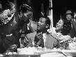 Sugar Ray Robinson Watching His Wife Feed His Sister An D'oeuvre At His Birthday Party by Ralph Morse Limited Edition Print