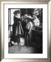 Children Trying On Old Clothes In The Attic, But Little Boy Would Prefer To Be Playing Football by Gordon Parks Limited Edition Print
