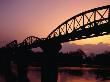 Sunset On Bridge Over The River Kwai, Kanchanaburi, Thailand by Bill Wassman Limited Edition Print