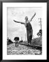 Larry Jim Holm, 12, With Dunk, Spaniel Collie Mix, Walking Rail Of Railroad Tracks In Rural Area by Myron Davis Limited Edition Pricing Art Print