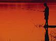 Boy Fishing, Sunset, Myanmar by Inga Spence Limited Edition Pricing Art Print