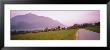 Empty Road Running Through A Town, Wolfgangsee, Austria by Panoramic Images Limited Edition Pricing Art Print