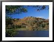 Loughrigg Tarn And Fell, Lake District National Park, Cumbria, England, United Kingdom by Roy Rainford Limited Edition Print
