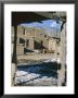 Multistorey Adobe Buildings In North Complex Dating From Around 1450 Ad, Taos Pueblo, New Mexico by Nedra Westwater Limited Edition Print