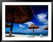 Thatched Umbrellas On An Beach, Trou D'eau Douce, Mauritius by Jean-Bernard Carillet Limited Edition Print