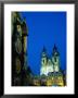 Trinity Church At Night Behind Town Hall And Astronomical Clock, Prague, Czech Republic by Richard Nebesky Limited Edition Print