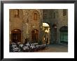 Restaurant In A Small Piazza, San Gimignano, Tuscany, Italy by Janis Miglavs Limited Edition Print