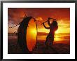 Native Hawaiian Man Beats His Drum On Makena Beach At Sunset by Mark Cosslett Limited Edition Print