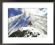 Snowboarder Jumps Off A Rock In Telluride, Telluride, Colorado by Paul Chesley Limited Edition Print