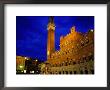 Imposing Torre Del Mangia And Palazzo Pubblico By Night, Siena, Tuscany, Italy by Glenn Beanland Limited Edition Print