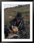 Portrait Of A Wrangler With His Pet Dog In Jasper National Park by Raymond Gehman Limited Edition Print