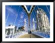 View Along Pedestrian Suspension Bridge At Salford Quays, Salford, Manchester, England by Lee Frost Limited Edition Print