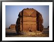 Qasr Farid Tomb, Carved From Single Large Outcrop Of Rock, Madain Salah, Al Madinah, Saudi Arabia by Tony Wheeler Limited Edition Print