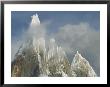 The Summit Of Cerro Torre Massif Rises Through The Clouds by Jimmy Chin Limited Edition Print