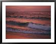 The Rising Sun Creates Beautiful Colors On The Waves by Bill Curtsinger Limited Edition Print