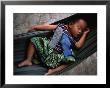 Baby Girl Sleeping In Hammock, Bavel, Cambodia by Jerry Galea Limited Edition Print