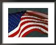 Close View Of One Of The American Flags Surrounding The Washington Monument by Kenneth Garrett Limited Edition Print