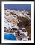 Pool Perched On Hillside With Village Houses, Fira, Santorini Island, Greece by Diana Mayfield Limited Edition Print