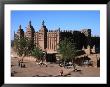 Oblique View Of The Facade, Entrance, Wall And Square Of The Djenne Mosque, Djenne, Mali by Patrick Syder Limited Edition Print