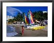 Woman And Yachts On Beach, Westin Regina Resort, Puerto Vallarta, Mexico by Richard Cummins Limited Edition Print