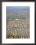 An Aerial View Of A Highly Developed Area Of Urban Sprawl by Rich Reid Limited Edition Print