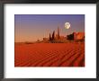 Totem Pole Buttes And Moon, Monument Valley, Ut by Michael Howell Limited Edition Pricing Art Print