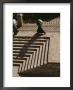 A Man Carrying A Sack Walks Past Stone Steps by Stephen St. John Limited Edition Print
