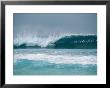 Surfer In The Crest Of A Wave In The Bonsai Pipeline In Oahu by Todd Gipstein Limited Edition Print