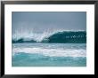 Surfer In The Crest Of A Wave In The Bonsai Pipeline In Oahu by Todd Gipstein Limited Edition Print