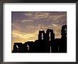 Silhouetted Ruins Of A Roman Amphitheatre At Sunset, Tunisia by Michele Molinari Limited Edition Print