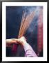 Worshipper Burning Incense In The Wong Tai Sin Temple, Kowloon, China by Michael Coyne Limited Edition Print