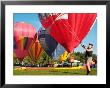 Balloon Handler At The Tigard Festival Of Balloons In Cook Park, Portland, Oregon, Usa by Janis Miglavs Limited Edition Print