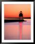 Two Harbors Breakwater Lighthouse Silhouetted At Sunset, Lake Superior, Two Harbours, Usa by Richard Cummins Limited Edition Print