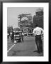 Coca Cola Sign And Thermometer Registering 100 Degrees During Columbus Circle Heat Wave In Ny. by Marie Hansen Limited Edition Pricing Art Print