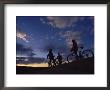 Cyclists Silhouetted Against A Cloudy Sky by Bill Hatcher Limited Edition Pricing Art Print