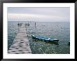 Canoe Tied To A Long Wooden Dock by Stephen Alvarez Limited Edition Print